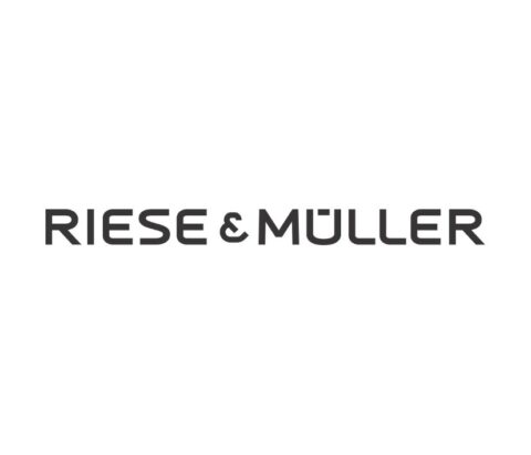 Logo von Riese & Müller, schwarzer Text auf weißem Hintergrund.