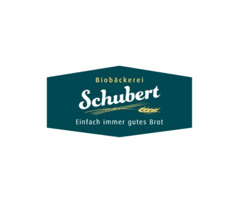 Logo der Biobäckerei Schubert mit dem Slogan 'Einfach immer gutes Brot' und einem Weizenähre-Design.
